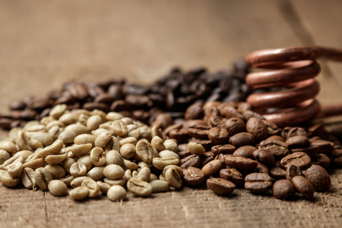 Different levels of roast coffee on table